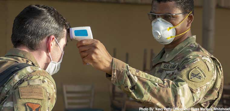 DOD temperature check (Photo By: Navy Petty Officer 2nd Class Marquis Whitehead)